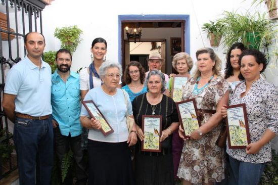 La delegada Encarnación Durán con los premiados