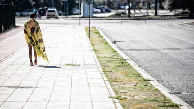 la-soledad-del-campeon-foto-maraton-sevilla-2014