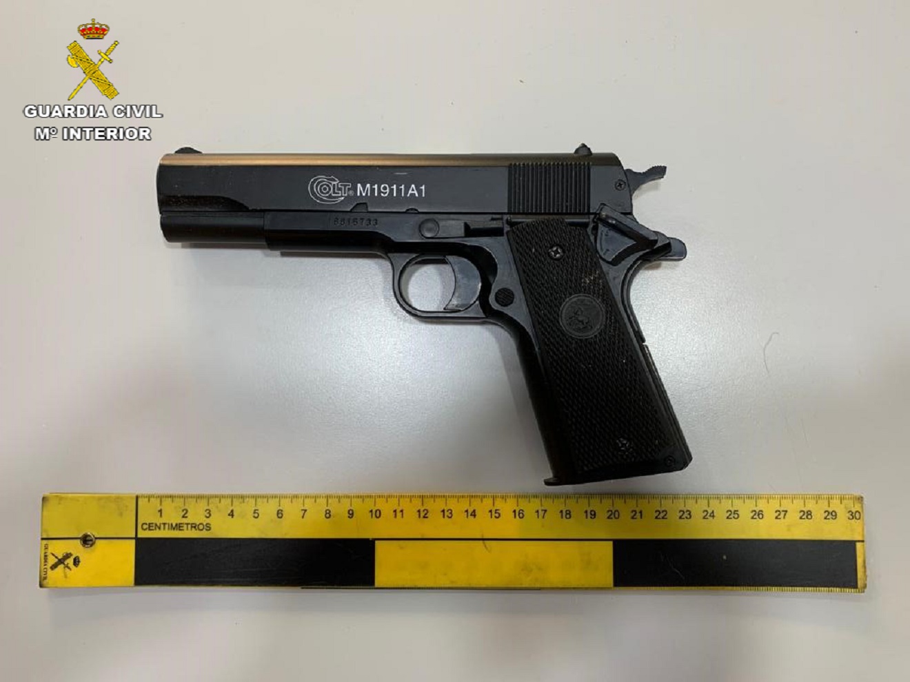 Pistola usada en un atraco / Imagen de archivo GC